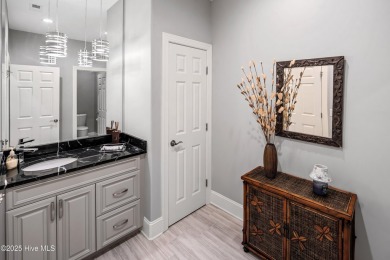Welcome to 704 Squire Lane, where timeless elegance meets modern on Porters Neck Country Club in North Carolina - for sale on GolfHomes.com, golf home, golf lot
