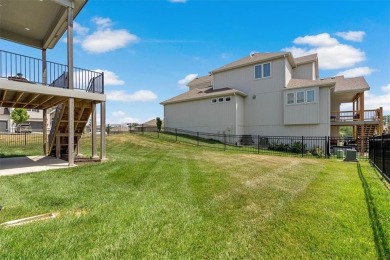 This 4-bedroom, 4-bath reverse 1.5-story is packed with upgrades on Heritage Park Golf Course in Kansas - for sale on GolfHomes.com, golf home, golf lot