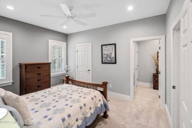 Welcome to 704 Squire Lane, where timeless elegance meets modern on Porters Neck Country Club in North Carolina - for sale on GolfHomes.com, golf home, golf lot