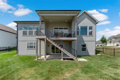 This 4-bedroom, 4-bath reverse 1.5-story is packed with upgrades on Heritage Park Golf Course in Kansas - for sale on GolfHomes.com, golf home, golf lot