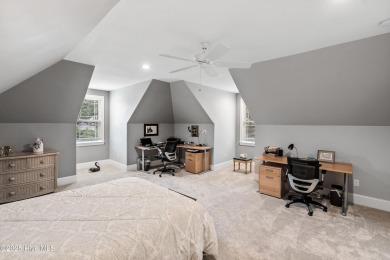 Welcome to 704 Squire Lane, where timeless elegance meets modern on Porters Neck Country Club in North Carolina - for sale on GolfHomes.com, golf home, golf lot