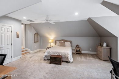 Welcome to 704 Squire Lane, where timeless elegance meets modern on Porters Neck Country Club in North Carolina - for sale on GolfHomes.com, golf home, golf lot