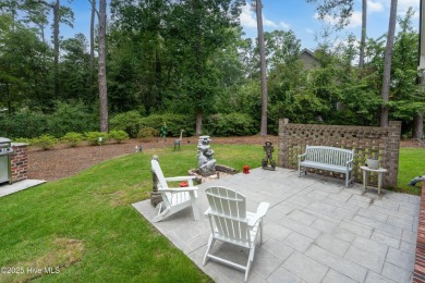 Welcome to 704 Squire Lane, where timeless elegance meets modern on Porters Neck Country Club in North Carolina - for sale on GolfHomes.com, golf home, golf lot