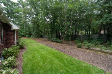 Welcome to 704 Squire Lane, where timeless elegance meets modern on Porters Neck Country Club in North Carolina - for sale on GolfHomes.com, golf home, golf lot