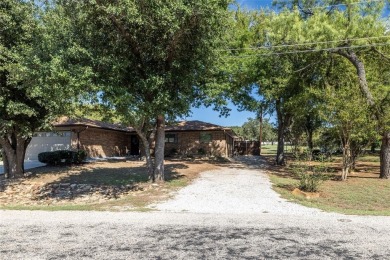 Experience the charm of this delightful 3-BR, 2-bath, 2-car on The Club At Runaway Bay in Texas - for sale on GolfHomes.com, golf home, golf lot