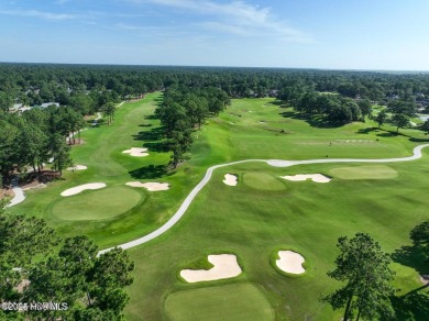 Welcome to 704 Squire Lane, where timeless elegance meets modern on Porters Neck Country Club in North Carolina - for sale on GolfHomes.com, golf home, golf lot
