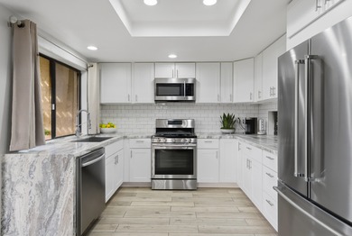 Beautifully remodeled and move-in ready, this stylish 3-bedroom on Desert Springs Golf Club in California - for sale on GolfHomes.com, golf home, golf lot