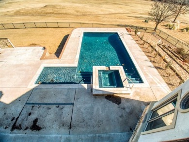 This breathtaking 4-bedroom, 3.5-bathroom, 3,953 sq. ft. home in on Shawnee Country Club in Oklahoma - for sale on GolfHomes.com, golf home, golf lot