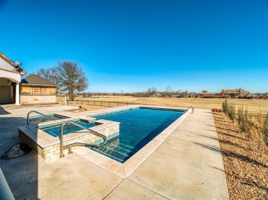 This breathtaking 4-bedroom, 3.5-bathroom, 3,953 sq. ft. home in on Shawnee Country Club in Oklahoma - for sale on GolfHomes.com, golf home, golf lot