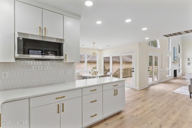 This beautifully remodeled 3-bedroom, 2-bathroom home in on Country Club of Landfall in North Carolina - for sale on GolfHomes.com, golf home, golf lot