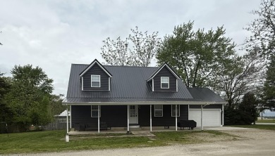This Cape Cod style home is in between St. Marys & Celina right on Northmoor Golf Club in Ohio - for sale on GolfHomes.com, golf home, golf lot