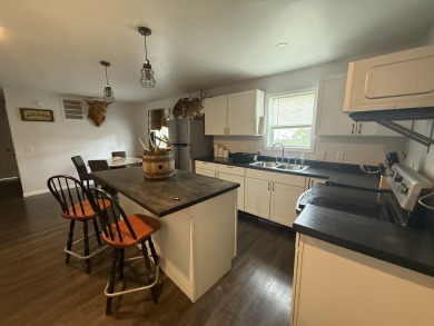 This Cape Cod style home is in between St. Marys & Celina right on Northmoor Golf Club in Ohio - for sale on GolfHomes.com, golf home, golf lot