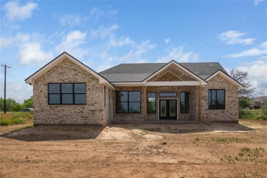 Discover luxury living at 7702 Feather Bay Dr, where new on Hideout Golf Club and Resort  in Texas - for sale on GolfHomes.com, golf home, golf lot
