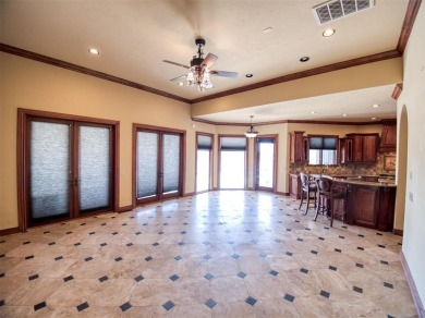 This breathtaking 4-bedroom, 3.5-bathroom, 3,953 sq. ft. home in on Shawnee Country Club in Oklahoma - for sale on GolfHomes.com, golf home, golf lot