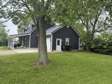 This Cape Cod style home is in between St. Marys & Celina right on Northmoor Golf Club in Ohio - for sale on GolfHomes.com, golf home, golf lot