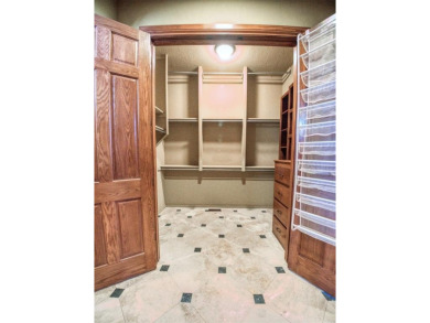 This breathtaking 4-bedroom, 3.5-bathroom, 3,953 sq. ft. home in on Shawnee Country Club in Oklahoma - for sale on GolfHomes.com, golf home, golf lot