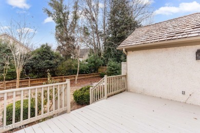 This beautifully remodeled 3-bedroom, 2-bathroom home in on Country Club of Landfall in North Carolina - for sale on GolfHomes.com, golf home, golf lot