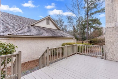 This beautifully remodeled 3-bedroom, 2-bathroom home in on Country Club of Landfall in North Carolina - for sale on GolfHomes.com, golf home, golf lot