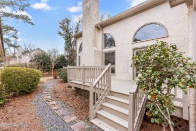 This beautifully remodeled 3-bedroom, 2-bathroom home in on Country Club of Landfall in North Carolina - for sale on GolfHomes.com, golf home, golf lot