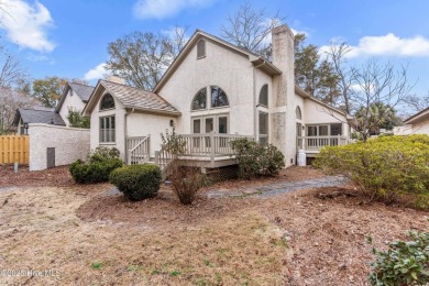 This beautifully remodeled 3-bedroom, 2-bathroom home in on Country Club of Landfall in North Carolina - for sale on GolfHomes.com, golf home, golf lot