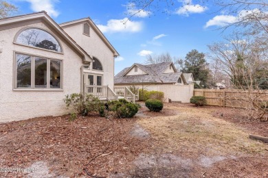 This beautifully remodeled 3-bedroom, 2-bathroom home in on Country Club of Landfall in North Carolina - for sale on GolfHomes.com, golf home, golf lot