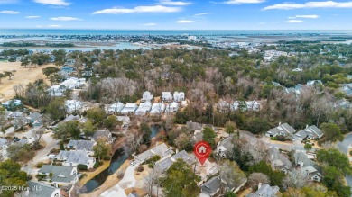 This beautifully remodeled 3-bedroom, 2-bathroom home in on Country Club of Landfall in North Carolina - for sale on GolfHomes.com, golf home, golf lot