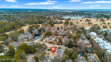 This beautifully remodeled 3-bedroom, 2-bathroom home in on Country Club of Landfall in North Carolina - for sale on GolfHomes.com, golf home, golf lot