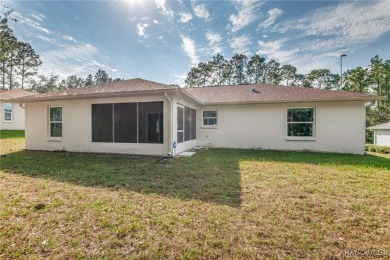 Quality built 3 BR, 2 Bath with a split floor plan, screen porch on Citrus Springs Country Club in Florida - for sale on GolfHomes.com, golf home, golf lot