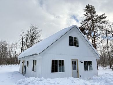 This charming Lakes of the North home has been fully renovated on Lakes of the North Deer Run Golf Course in Michigan - for sale on GolfHomes.com, golf home, golf lot