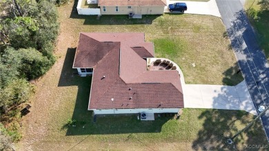 Quality built 3 BR, 2 Bath with a split floor plan, screen porch on Citrus Springs Country Club in Florida - for sale on GolfHomes.com, golf home, golf lot