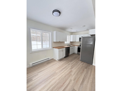 This charming Lakes of the North home has been fully renovated on Lakes of the North Deer Run Golf Course in Michigan - for sale on GolfHomes.com, golf home, golf lot