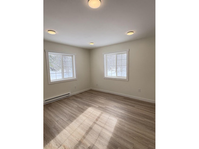 This charming Lakes of the North home has been fully renovated on Lakes of the North Deer Run Golf Course in Michigan - for sale on GolfHomes.com, golf home, golf lot