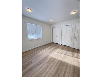 This charming Lakes of the North home has been fully renovated on Lakes of the North Deer Run Golf Course in Michigan - for sale on GolfHomes.com, golf home, golf lot