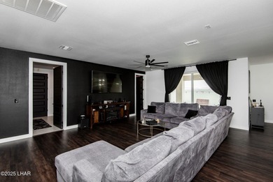 Presenting 6393 S Via De Oro, Fort Mohave, Arizona, a custom on Los Lagos Golf Club in Arizona - for sale on GolfHomes.com, golf home, golf lot