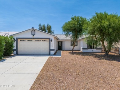 Welcome to this well-maintained 3 bedroom, 2 bathroom home on Desert Lakes Golf Course in Arizona - for sale on GolfHomes.com, golf home, golf lot