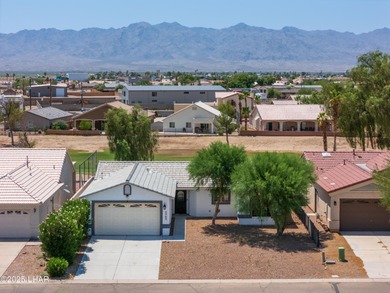 Welcome to this well-maintained 3 bedroom, 2 bathroom home on Desert Lakes Golf Course in Arizona - for sale on GolfHomes.com, golf home, golf lot