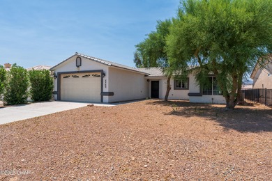 Welcome to this well-maintained 3 bedroom, 2 bathroom home on Desert Lakes Golf Course in Arizona - for sale on GolfHomes.com, golf home, golf lot
