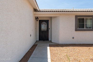 Welcome to this well-maintained 3 bedroom, 2 bathroom home on Desert Lakes Golf Course in Arizona - for sale on GolfHomes.com, golf home, golf lot