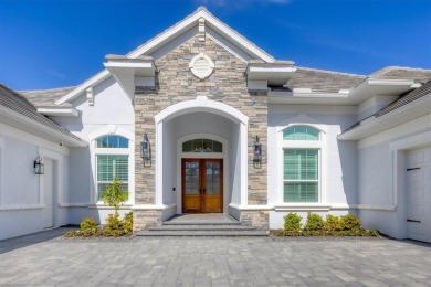 Welcome to 12411 Highfield Circle, a breathtaking custom-built on Lakewood Ranch Golf and Country Club in Florida - for sale on GolfHomes.com, golf home, golf lot