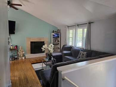 This 4 bedroom, 2 bath split level home sits in an amenity on Pocono Farms Country Club in Pennsylvania - for sale on GolfHomes.com, golf home, golf lot