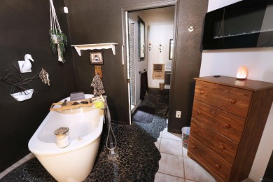 Welcome to this charming and move-in-ready 3-bedroom, 2-bathroom on Las Barrancas Golf Course in Arizona - for sale on GolfHomes.com, golf home, golf lot