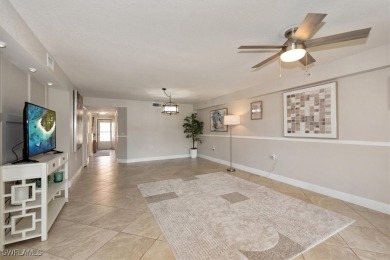 Enjoy serene water views in this bright, first-floor condo in on Bonita Fairways in Florida - for sale on GolfHomes.com, golf home, golf lot