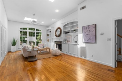 Nestled on a quiet street in sought-after Collier Hills, this on Bobby Jones Golf Club in Georgia - for sale on GolfHomes.com, golf home, golf lot