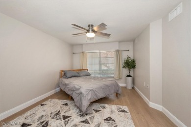 Enjoy serene water views in this bright, first-floor condo in on Bonita Fairways in Florida - for sale on GolfHomes.com, golf home, golf lot