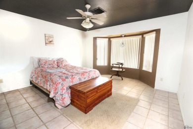 Welcome to this charming and move-in-ready 3-bedroom, 2-bathroom on Las Barrancas Golf Course in Arizona - for sale on GolfHomes.com, golf home, golf lot