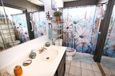 Welcome to this charming and move-in-ready 3-bedroom, 2-bathroom on Las Barrancas Golf Course in Arizona - for sale on GolfHomes.com, golf home, golf lot
