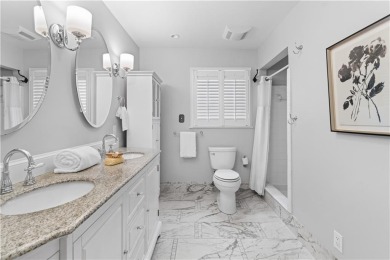 Nestled on a quiet street in sought-after Collier Hills, this on Bobby Jones Golf Club in Georgia - for sale on GolfHomes.com, golf home, golf lot