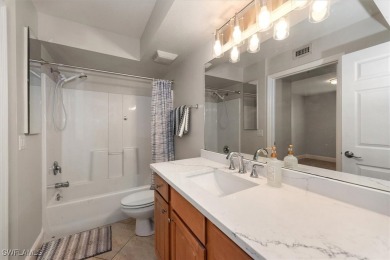 Enjoy serene water views in this bright, first-floor condo in on Bonita Fairways in Florida - for sale on GolfHomes.com, golf home, golf lot