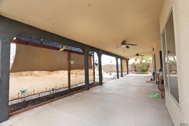 Welcome to this charming and move-in-ready 3-bedroom, 2-bathroom on Las Barrancas Golf Course in Arizona - for sale on GolfHomes.com, golf home, golf lot