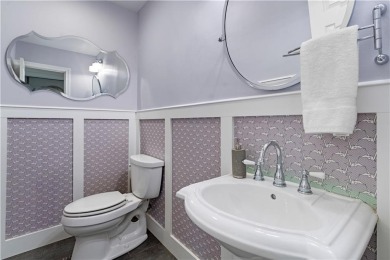 Nestled on a quiet street in sought-after Collier Hills, this on Bobby Jones Golf Club in Georgia - for sale on GolfHomes.com, golf home, golf lot